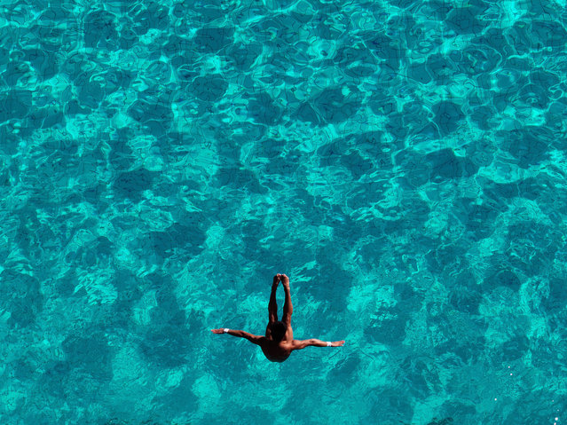An athlete practices prior to Boys 3 Meter Springboard preliminaries at Julio Delamare water park during Day 2 of the World Aquatics Junior Diving Championships 2024, on November 25, 2024 in Rio de Janeiro, Brazil. (Photo by Wagner Meier/Getty Images)