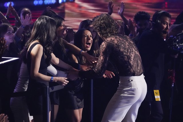 Benson Boone greets fans during the iHeartRadio Music Awards, on Monday, March 17, 2025, at the Dolby Theatre in Los Angeles. (Photo by Chris Pizzello/AP Photo)