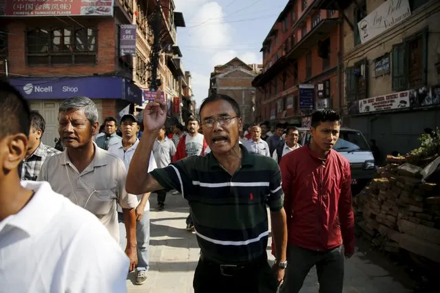 Opposition supporters chanting slogans protest against the proposed constitution during the nationwide strike, called by the opposition parties in Kathmandu, Nepal September 20, 2015. (Photo by Navesh Chitrakar/Reuters)