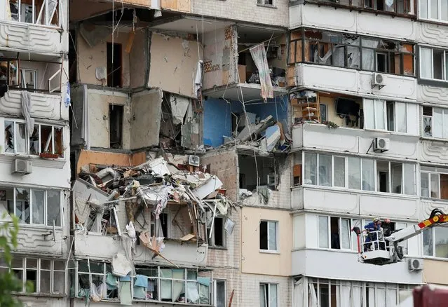 A view shows an apartment block, which partially collapsed after a suspected gas explosion, in Kyiv, Ukraine on June 21, 2020. (Photo by Gleb Garanich/Reuters)