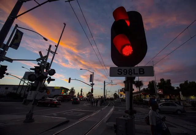 A street car signal informs drivers at a transit hub after sundown in the border town of San Ysidro, California September 2, 2015. Picture taken September 2, 2015. (Photo by Mike Blake/Reuters)