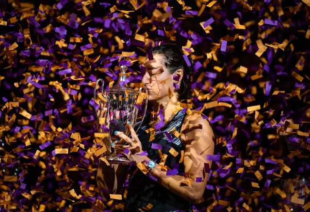 Caroline Garcia of France poses with the champions trophy after defeating Aryna Sabalenka of Belarus in the singles final match on Day 8 of the 2022 WTA Finals, part of the Hologic WTA Tour, at Dickies Arena on November 07, 2022 in Fort Worth, Texas (Photo by Robert Prange/Getty Images)