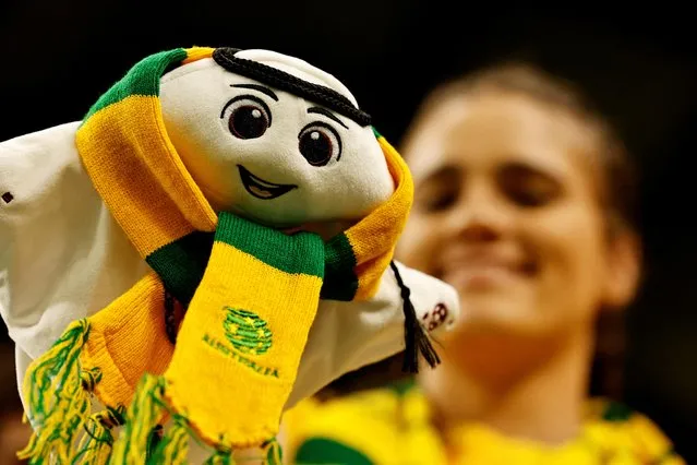 Australia fan holds up FIFA World Cup Qatar 2022 mascot La'eeb before the FIFA World Cup Qatar 2022 Group D match between Australia and Denmark at Al Janoub Stadium in Al Wakrah, Qatar on November 30, 2022. (Photo by Hamad I Mohammed/Reuters)