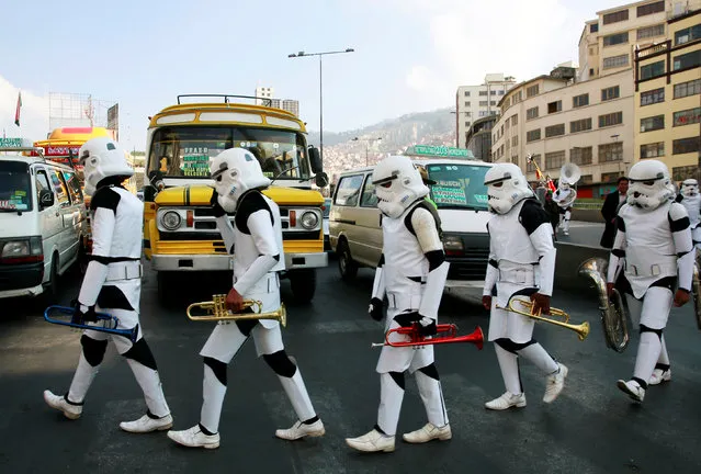 Members of a school band wearing Star Wars costumes walk in the center of La Paz, Bolivia, September 19, 2016. (Photo by David Mercado/Reuters)