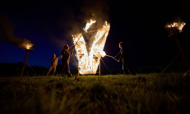 A large Victory V beacon is lit forming part of the 80th VE Day commemorations in the village of East Hoathly near Lewes, UK on May 8, 2025. (Photo by Jim Holden/Alamy Live News)