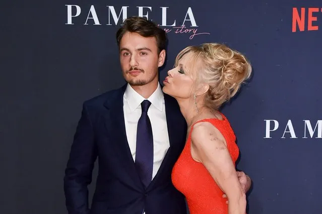 American actor Brandon Thomas Lee, left, and Canadian-American actress Pamela Anderson arrive at the world premiere of “Pamela, a love story” on Monday, Jan. 30, 2023, at the Tudum Theater in Los Angeles. (Photo by Richard Shotwell/Invision/AP Photo)
