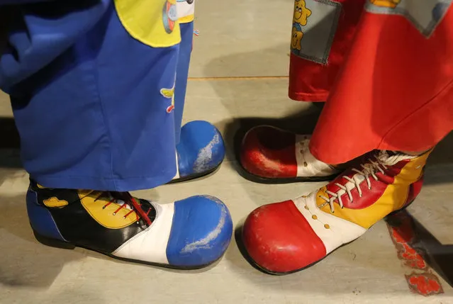 Clown's shoes are seen during the first clown festival in Belarus in Bobruisk, some 150 km from Minsk, Belarus, 01 April 2018. (Photo by Tatyana Zenkovich/EPA/EFE)