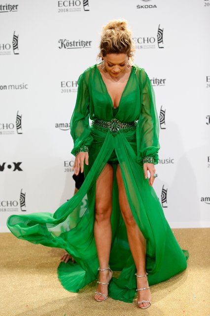 British singer Rita Ora poses during a photocall upon arrival for the 2018 Echo Music Awards ceremony Thursday, April 12, 2018 in Berlin. (Photo by Axel Schmidt/pool photo via AP Photo)