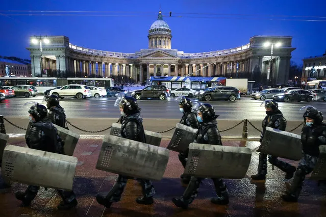 Riot police outside the Kazan Cathedral in Nevsky Avenue in St Petersburg, Russia on February 2, 2021. The city authorities tighten security measures as Moscow's court rules to convert Russian opposition activist Alexei Navalny's suspended sentence of three and a half years in the Yves Rocher case into a real jail term. (Photo by Peter Kovalev/TASS)