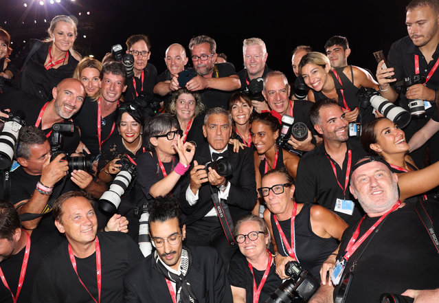 American actor George Clooney poses with photographers as he attends the “Wolfs” red carpet during the 81st Venice International Film Festival on September 01, 2024 in Venice, Italy. (Photo by Pascal Le Segretain/Getty Images)
