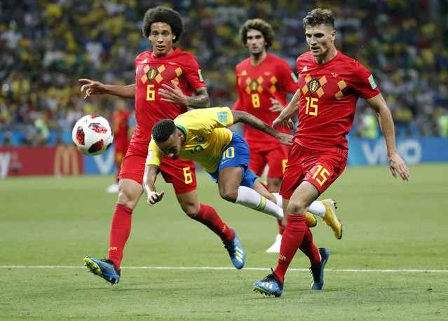 Neymar of Brazil (C) and Thomas Meunier of Belgium (R) in action during the FIFA World Cup 2018 quarter final soccer match between Brazil and Belgium in Kazan, Russia, 06 July 2018. (Photo by Sergey Dolzhenko/EPA/EFE)