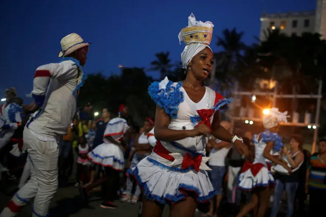 Members of a comparsa, a Cuban carnival group, perform in Havana, Cuba on August 4, 2018. (Photo by Tomas Bravo/Reuters)