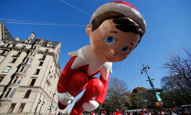 The Elf on a Shelf balloon floats down Central Park West during the 92nd Annual Macy's Thanksgiving Day Parade on November 22, 2018 in New York City. (Photo by Gary Hershorn/Getty Images)