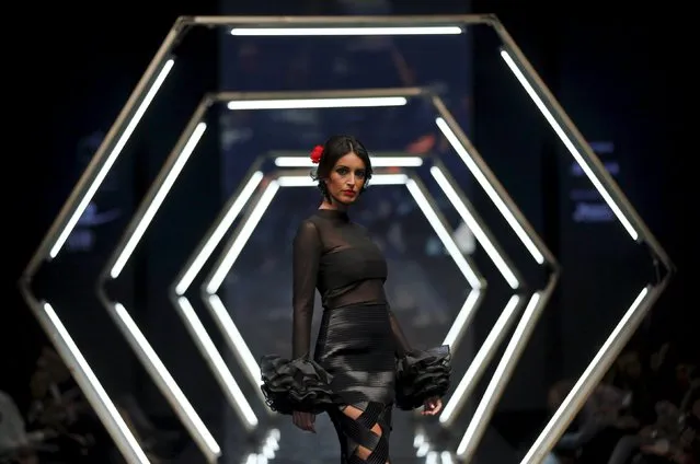 A model presents a creation by Maria de Gracia during the International Flamenco Fashion Show (SIMOF) in the Andalusian capital of Seville, southern Spain, February 5, 2016. (Photo by Marcelo del Pozo/Reuters)