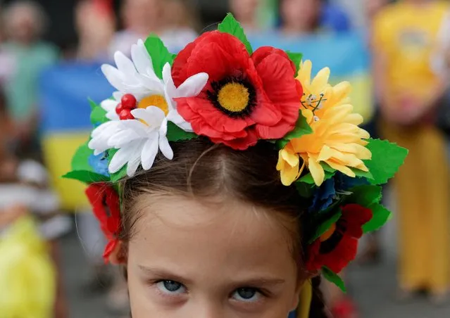 Leyla, a four-year old Ukrainian girl, takes part in a demonstration to mark Ukraine's Independence Day, in Istanbul, Turkey on August 24, 2022. (Photo by Murad Sezer/Reuters)