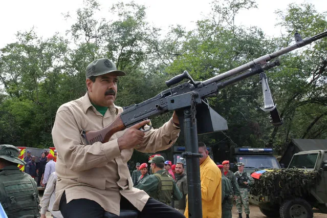 Venezuela's President Nicolas Maduro takes part in a military drill in Charallave, Venezuela January 14, 2017. (Photo by Reuters/Miraflores Palace)