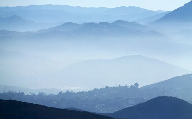 Morning fog covers local inland hillsides near San Marcos, California January 19, 2016. (Photo by Mike Blake/Reuters)
