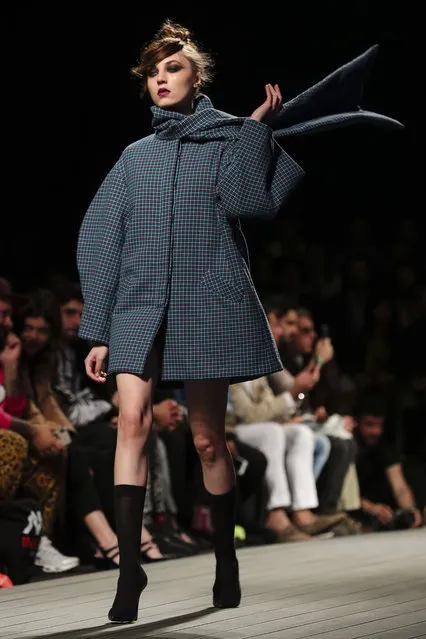 A model displays a creation by Portuguese fashion designer Luis Carvalho on the second day of the Lisbon Fashion Week, at Carlos Lopes Pavillion in Lisbon, Portugal, 09 March 2019. (Photo by Miguel A. Lopes/EPA/EFE)