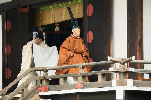Japan's Emperor Akihito, right, leaves after a ritual to report his abdication to the throne, at the Imperial Palace in Tokyo, Tuesday, April 30, 2019. The 85-year-old Akihito ends his three-decade reign on Tuesday when he abdicates to his son Crown Prince Naruhito. (Photo by Japan Pool via AP Photo)