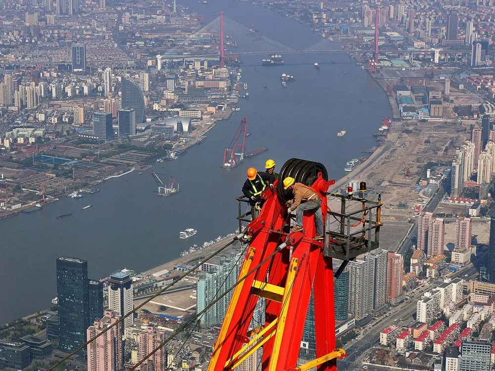 Shanghai Tower Cranes Come Down