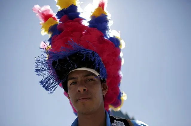 A Matachin dancer participates in a religious festival in Saltillo, Mexico, April 17, 2016. (Photo by Daniel Becerril/Reuters)