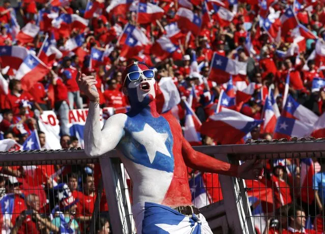 Chile fans cheer ahead of the team's Copa America 2015 final soccer match against Argentina at the National Stadium in Santiago, Chile, July 4, 2015. (Photo by Henry Romero/Reuters)