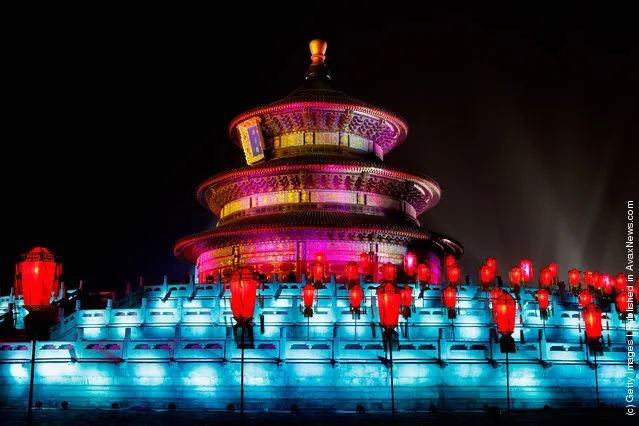 The Temple of Heaven (The Qi Nian Temple) is illuminated as Beijing celebrates the New Year's Eve at the Temple of Heaven Park