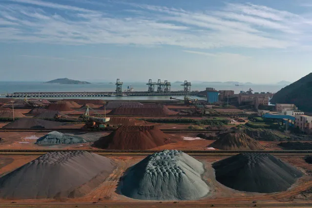 Piles of imported iron ore at a port in Zhoushan, China on May 12, 2019. (Photo by Reuters/China Stringer Network)