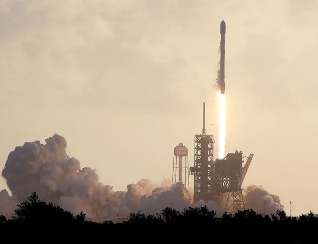A Falcon 9 SpaceX rocket carrying a classified satellite for the National Reconnaissance Office lifts off from pad 39A at the Kennedy Space Center in Cape Canaveral, Fla., Monday, May 1, 2017. (Photo by John Raoux/AP Photo)