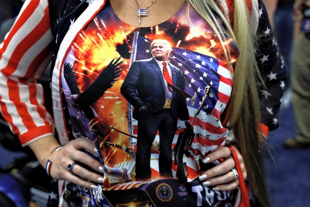 A person wears a top with an image of former U.S. President Donald Trump during the National Rifle Association (NRA) annual convention in Indianapolis, Indiana, U.S., April 15, 2023. (Photo by Evelyn Hockstein/Reuters)