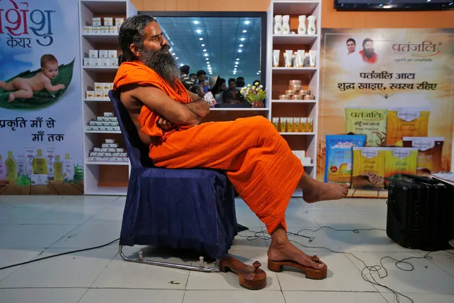 Indian yoga guru Baba Ramdev talks to media after a news conference in New Delhi, India, May 4, 2017. The photo was released on May 23. (Photo by Adnan Abidi/Reuters)
