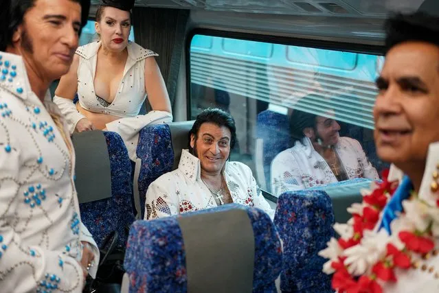 Elvis Presley impersonator Ross Mancini chats with fellow enthusiasts while boarding a train at Sydney Central Railway Station before departing for the Parkes Elvis Festival, as the event returns following the coronavirus disease (COVID-19) pandemic, in Sydney, Australia, April 21, 2022. (Photo by Loren Elliott/Reuters)