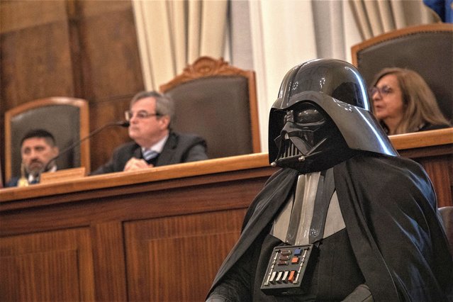 The Valparaíso Court of Justice holds a mock trial against science fiction character Darth Vader in Valparaiso, Chile, on May 28, 2023.  The trial takes place as part of Chile's Heritage Day celebrations.In the context of a new Heritage Day, one of the activities taking place in the country involves one of the most memorable villains in cinema: Darth Vader from the Star Wars film saga. (Photo by Rafael Arancibia/AFP Photo)