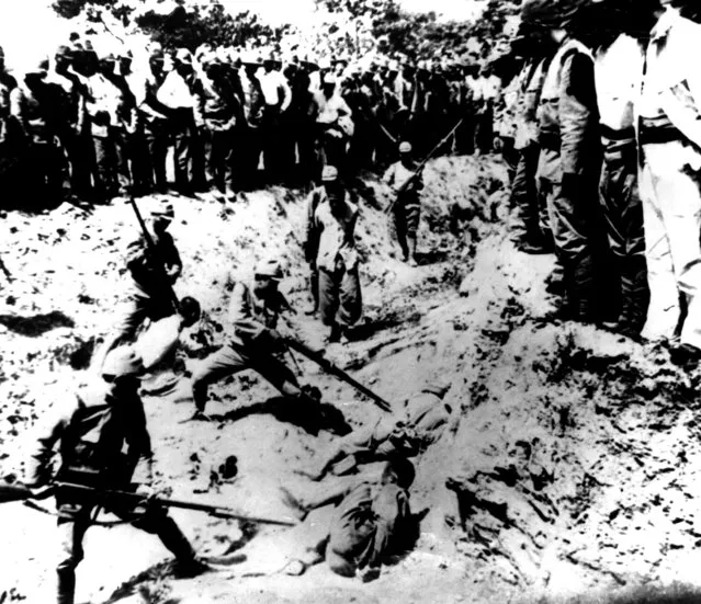 Japanese recruits at bayonet drill using Chinese prisoners as targets, after the capture of the Chinese capital, Nanking (Nanjing) during the Sino-Japanese conflict, on December 1937. (Photo by Keystone/Getty Images)