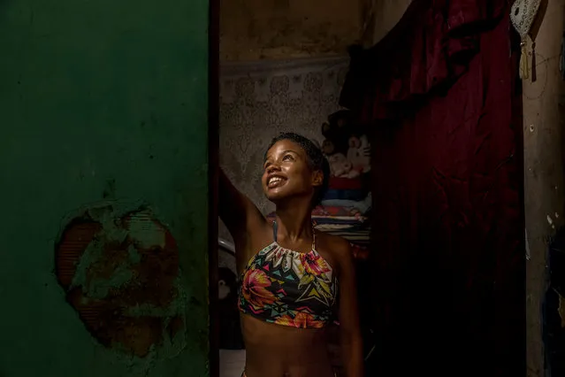 Victoria, 12, at her home in Mangueira. (Photo by Tariq Zaidi/The Guardian)