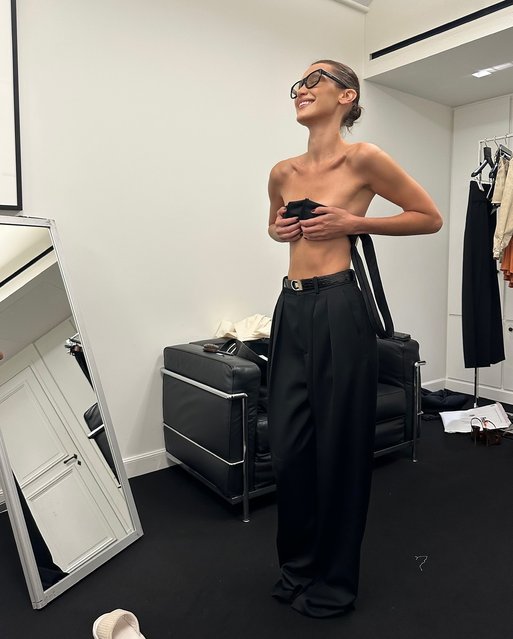 American fashion model Bella Hadid shares a laugh backstage at the YSL Paris show on September 26, 2024. (Photo by bellahadid/Instagram)