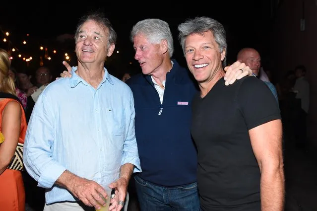 Actor Bill Murray, left, former U.S. President Bill Clinton, center, and musician Jon Bon Jovi attend the Hamptons Sneak Screening of Open Road Films' “Rock the Kasbah” on Friday, August 28, 2015 in East Hampton, N.Y. (Photo by Scott Roth/Invision for Open Road Films/AP Images)