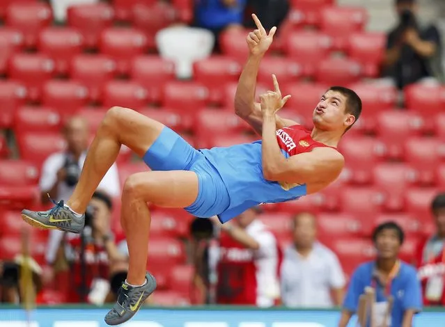 Ilya Shkurenev of Russia reacts as he competes in the pole vault event of the men's decathlon during the 15th IAAF World Championships at the National Stadium in Beijing, China, August 29, 2015.    REUTERS/Kai Pfaffenbach TPX IMAGES OF THE DAY