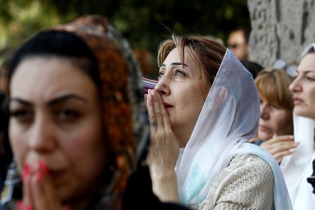 Armenians pray during the Divine Liturgy at the Open Altar of St. Trdat in the Mother See of Holy Etchmiadzin, Armenia, 01 October 2023. Under the chairmanship of His Holiness Garegin II, Supreme Patriarch and Catholicos of All Armenians, the day of 01 October was declared the National Day of Prayer for Artsakh, on the occasion of which a special prayer service was held in the Mother See of Holy Etchmiadzin and in all churches of Armenia and the Diaspora. Azerbaijan on 19 September 2023 launched a brief military offensive on the contested region of Nagorno-Karabakh, a breakaway enclave that is home to some 120,000 ethnic Armenians. Following a ceasefire agreed on 20 September 2023, Azerbaijan opened all checkpoints with Armenia for the unimpeded exit of civilians from the disputed territory. The Armenian government announced the evacuation of more than 100,000 local residents from Nagorno-Karabakh, and a humanitarian center has been set up in the village of Kornidzor near the so-called Lachin corridor, the main route between Armenia and the breakaway region. (Photo by Anatoly Maltsev/EPA/EFE)