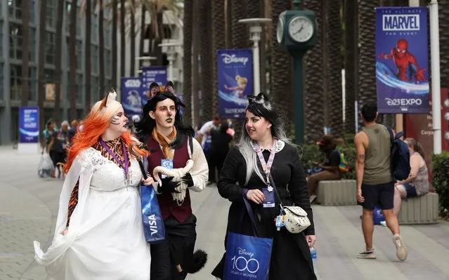 People in costumes walk at Disney's D23 Expo in Anaheim, California, U.S., September 9, 2022. (Photo by Mario Anzuoni/Reuters)