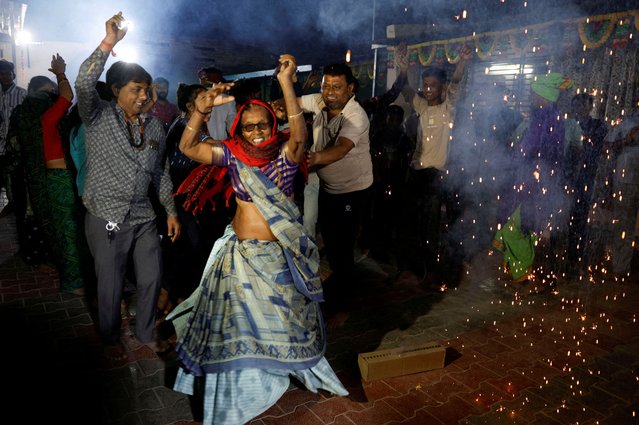 People celebrate after the splashdown of the SpaceX Dragon spacecraft and the safe return of U.S. astronaut Sunita Williams at her native village of Jhulasan in the western Indian state of Gujarat, India on March 18, 2025. (Photo by Amit Dave/Reuters)