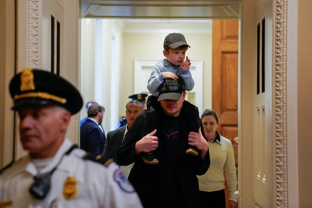 Tesla CEO Elon Musk and his son X Æ A-12 depart the U.S. Capitol after meeting with lawmakers, including Senate Commerce Committee members, at the U.S. Capitol in Washington, D.C., U.S., May 21, 2025. (Photo by Elizabeth Frantz/Reuters)