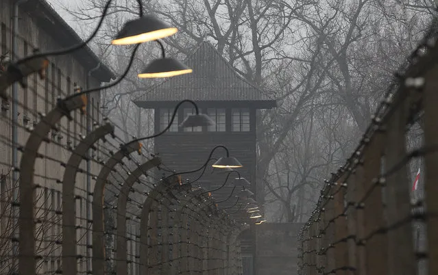Barbed wire fences are pictured at the former Nazi German concentration and extermination camp Auschwitz on the International Holocaust Remembrance Day in Oswiecim, Poland, Saturday, January 27, 2018. (Photo by Czarek Sokolowski/AP Photo)