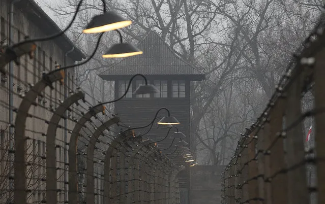 Barbed wire fences are pictured at the former Nazi German concentration and extermination camp Auschwitz  on the International Holocaust Remembrance Day in Oswiecim, Poland, Saturday, January 27, 2018. (Photo by Czarek Sokolowski/AP Photo)