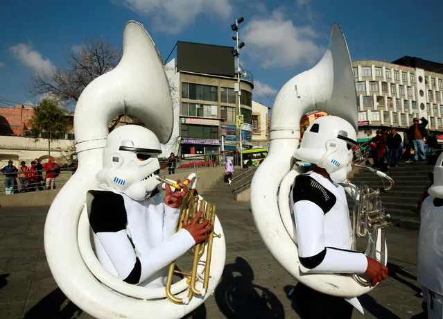 Members of a school band wearing Star Wars costumes perform at San Francisco square in the center of La Paz, Bolivia, September 19, 2016. (Photo by David Mercado/Reuters)
