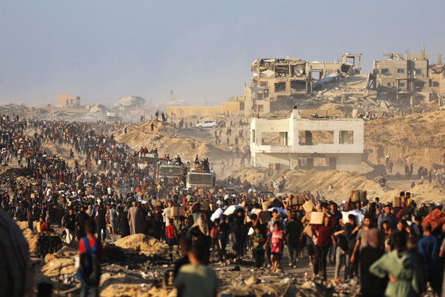 Palestinians gather to receive aid supplies in Beit Lahia, in the northern Gaza Strip on June 16, 2025. (Photo by Dawoud Abu Alkas/Reuters)
