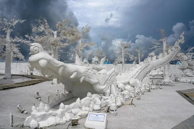 This photograph taken on September 2, 2020 shows sculptures of mythical creatures made of white sand imitating ice in the “Frost Magical Ice of Siam” park outside Pattaya. (Photo by Mladen Antonov/AFP Photo) 