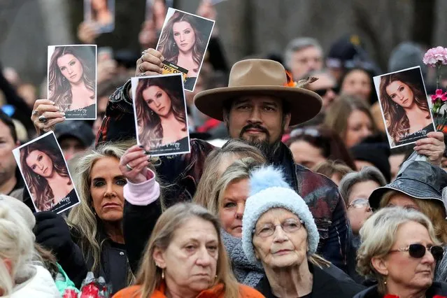 Music fans attend a public memorial for singer Lisa Marie Presley, the only daughter of the “King of Rock 'n' Roll”, Elvis Presley, at Graceland Mansion in Memphis, Tennessee, U.S. January 22, 2023. (Photo by Nikki Boertman/Reuters)