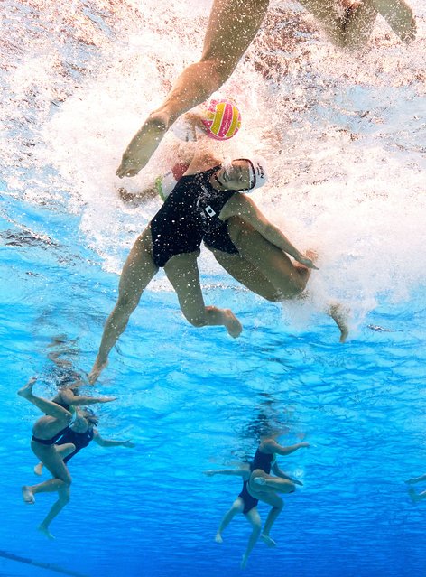 Hikaru Shitara of Team Japan is challenged by an opponent in the Women's Water Polo Classification 7th-8th Place match between Japan and Italy on day 13 of the Singapore 2025 World Aquatics Championships at OCBC Aquatic Centre on July 23, 2025 in Singapore. (Photo by Quinn Rooney/Getty Images)