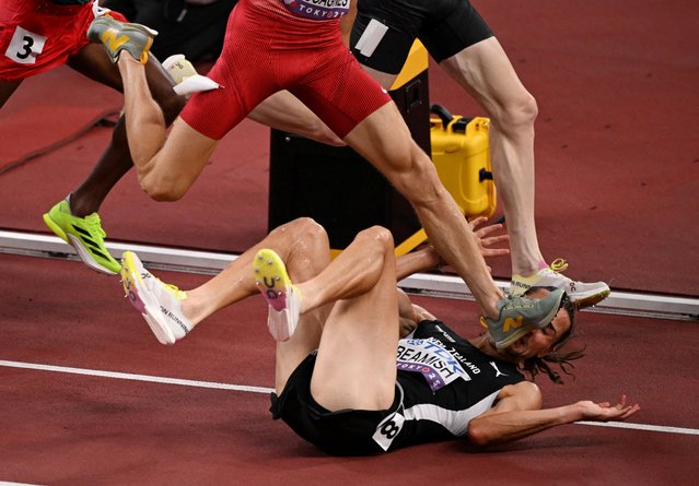 New Zealand's Geordie Beamish falls over during the men's 3000m Steeplechase Round 1 heats on September 13, 2025. (Photo by Dylan Martinez/Reuters)